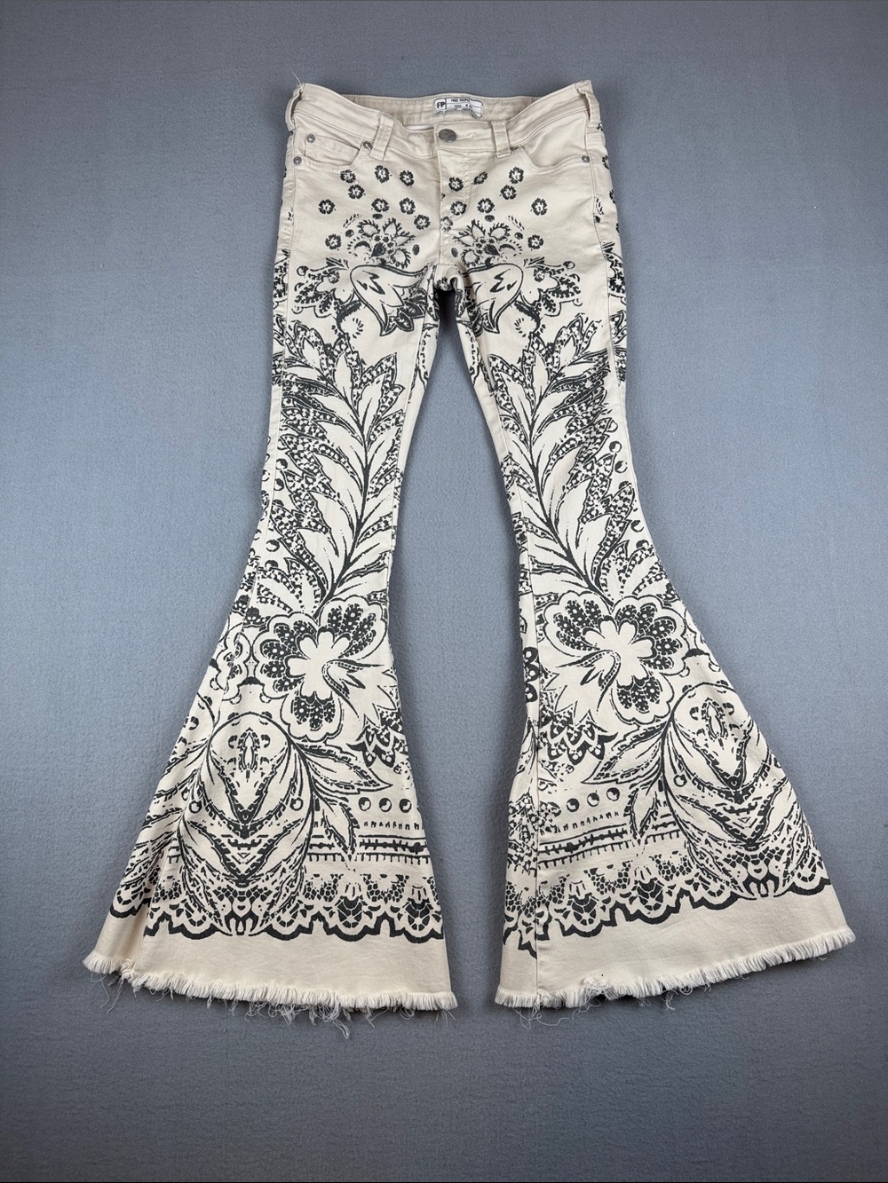 Free People Bali Cream Super Flare Pants with Black Floral Print
Size: 26